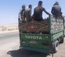 حوادث متفرقة وضبط مركبة تقل 14 راكبا في صندوقها على طريق المطار